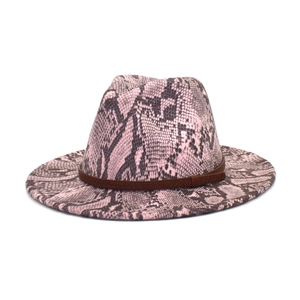Detail showing pink snakeskin pattern wool fedora with brown braided decorative band