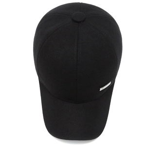 Classic black men's winter baseball cap with ear protection in textured cotton twill
