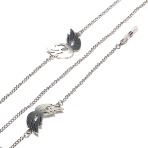 Detail of silver eyewear chain with hollow wing charms and adjustable silicone loops