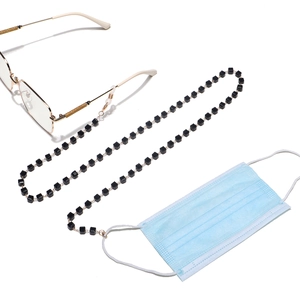 Gold-tone eyewear chain with black square crystal beads used for sunglasses or face masks