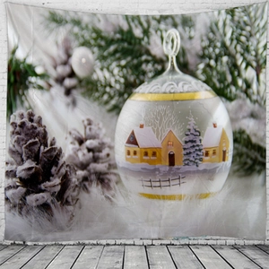 Detail view of large Christmas tapestry featuring festive snow house design in a glass ball