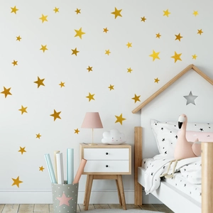 Minimalistische goldene Sternen-Wandtattoos für Kinderzimmer in verschiedenen Sterngrößen