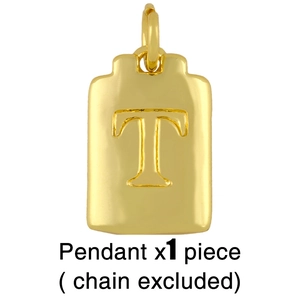 Macro shot of gold rectangle pendant featuring an engraved letter T with top ring