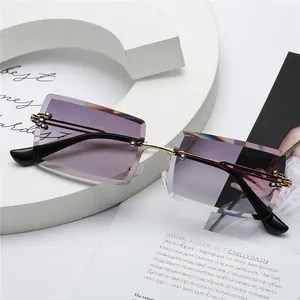 Fashionable small square rimless sunglasses with gradient purple lenses for women