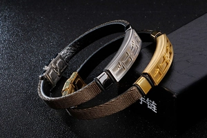 Detail of stainless steel clasp with heartbeat engraving on black leather bracelets