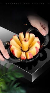 Macro view of 304 stainless steel apple slicer dividing fruit into 12 perfect wedges
