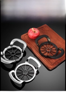 Detail of 12-blade zinc alloy apple slicers in matte black and polished silver finishes