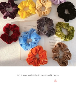 Macro shot of 10 assorted colors velvet scrunchies with soft texture and glossy finish