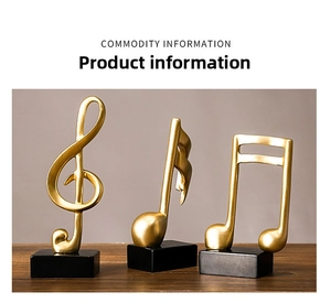 Detailed view of resin musical note sculptures in matte gold on black bases