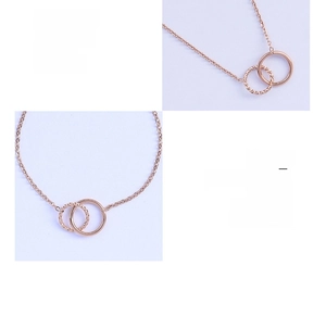 Detail of interlocking circle necklace in 18K rose gold plated titanium steel