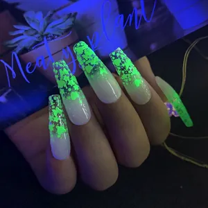 Glow-in-the-dark long coffin press-on nails with green luminous butterfly and stars