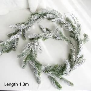 Artificial 1.8m Christmas pine garland with heavy snow finish for holiday home decoration