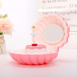 Pink shell music box with a rotating ballerina and flower background for gifts