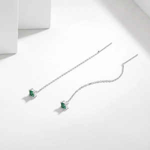 Elegant s925 silver threader earrings with square emerald green stones on white background