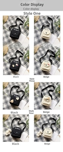 Detail view of small canvas crossbody bags in black and beige with various cute charms