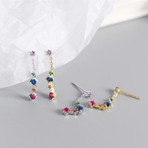 Detail of S925 silver fringe earrings featuring colorful zircon stones in gold and silver