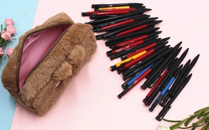 Detailed view of brown plush bear pencil case showing large capacity and soft faux fur material
