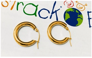 Detailed view of bold 18k gold plated stainless steel hoop earrings with polished finish