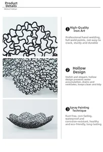 Detail of hand-welded black iron wire mesh with wavy edges and industrial finish