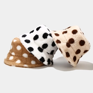 Plush polka dot bucket hats for winter in brown, white, and beige fluffy faux fur material