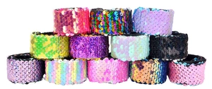 Detail of colorful sequined bracelets in pink and purple for girls mermaid backpack style