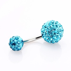 Macro shot of light blue crystal double ball belly ring with polished curved barbell