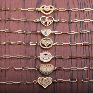 Set di bracciali a catena cubana con cuori in zircone colorati e finitura dorata