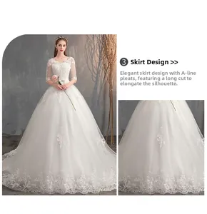 Dettaglio del ricamo in pizzo e della gonna a trapezio su un abito da sposa bianco con scollo a V