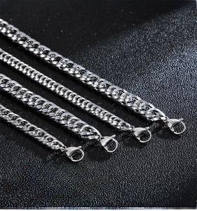 Detail showing the heavy-duty lobster clasp design on durable stainless steel chains