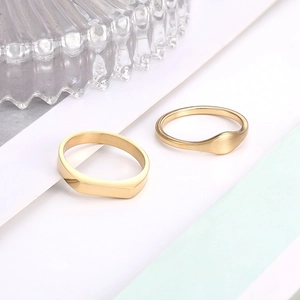 Irregular 14K gold plated stainless steel ring set with matte and polished finishes