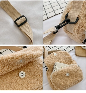 Detail view of khaki faux fur bag showing magnetic buckle and adjustable strap hooks