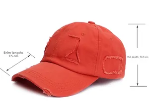 Detail of distressed orange baseball cap with 7.5cm brim and 13.5cm depth measurements