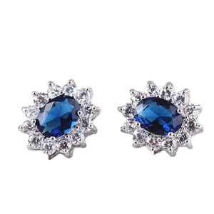 Elegant silver-plated earrings with oval dark blue gemstone and AAA zircon halo