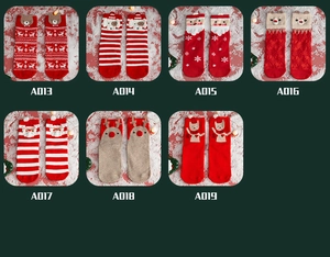 Detail view of 7 Christmas sock styles featuring reindeer, Santa and bear patterns