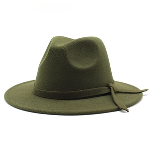 Detail shot of the olive green wool fedora with a matching grosgrain ribbon and side bow