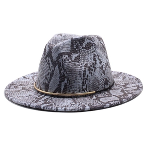 Detailed shot of grey snakeskin pattern wool felt fedora with a sleek gold metal band