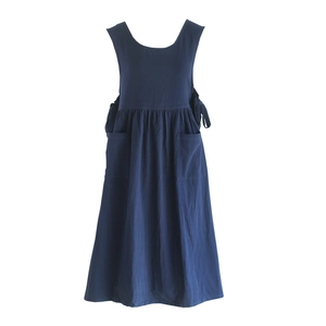 Plus size navy cotton apron with side ties and large pockets for floral or nail art work