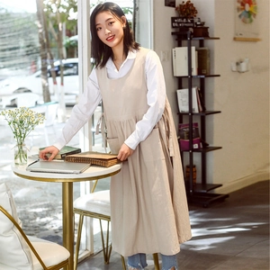 Minimalist beige cotton apron with side ties and front pocket for florists and cafes