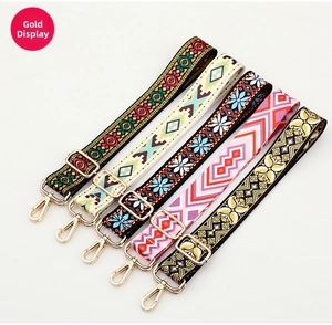 Detail of five bohemian style adjustable bag straps with colorful ethnic patterns
