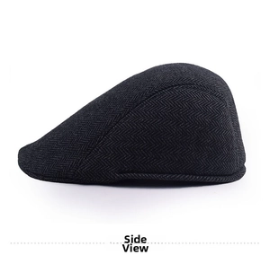 Side view of black herringbone tweed ivy cap featuring retro winter knit wool texture