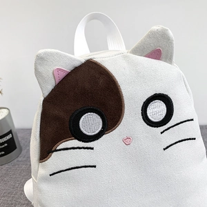 White canvas backpack with cute 3D cat ears and embroidery, minimalist student style