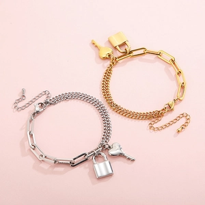 Titanium steel link chain bracelet featuring creative lock and heart key charms in gold and silver