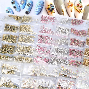 K9 crystal glass nail art rhinestones kit with various sizes in a multi-grid storage box