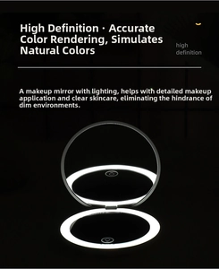 Close-up of black folding LED makeup mirror with high-definition ring light detail