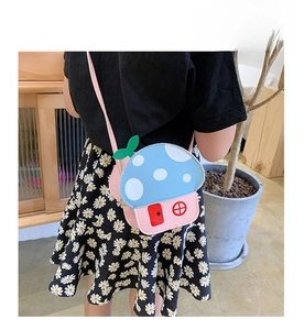 Detailed back view of a pink mushroom-shaped crossbody bag for girls with adjustable strap