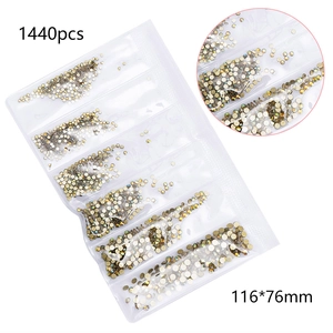 Detail of 1440pcs mixed size Aurora gold K9 crystal nail rhinestones in 116x76mm bag