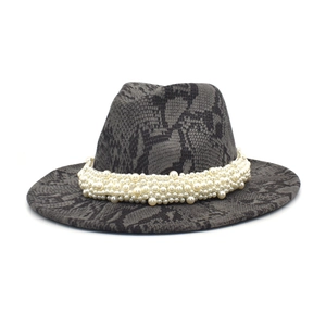 Close-up of the grey snake skin pattern felt fedora hat featuring a white pearl headband