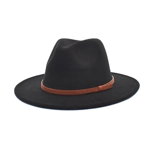 Detailed view of black wool fedora hat featuring a brown textured braided leather band