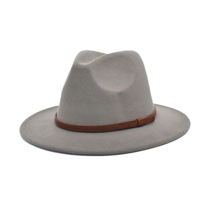 Close-up of light gray wool felt jazz hat with a brown woven texture decorative band