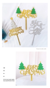 Close-up of glitter Merry Christmas and Let it Snow acrylic cake toppers on a white cake